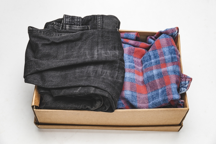 Pack your clothes into small boxes.